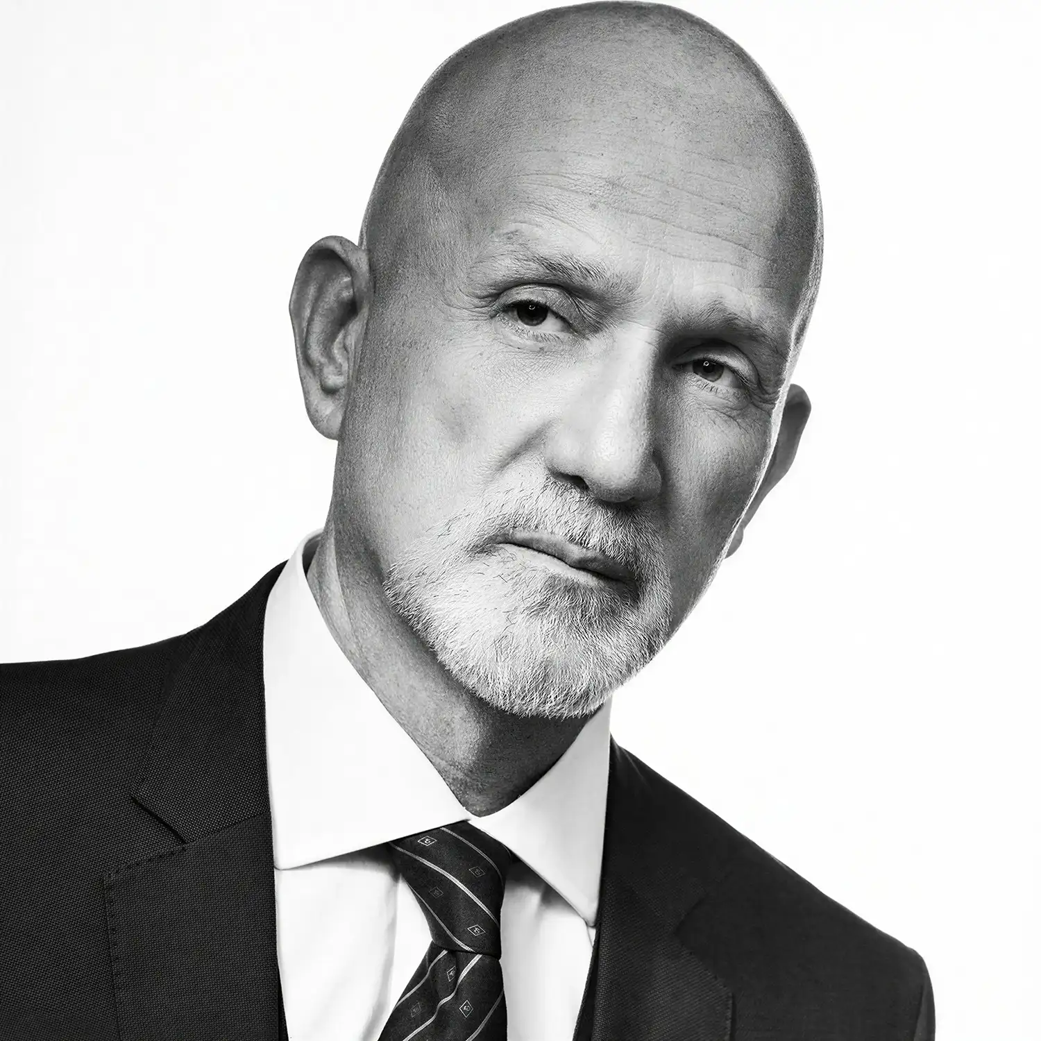 Black and white portrait of a suited executive