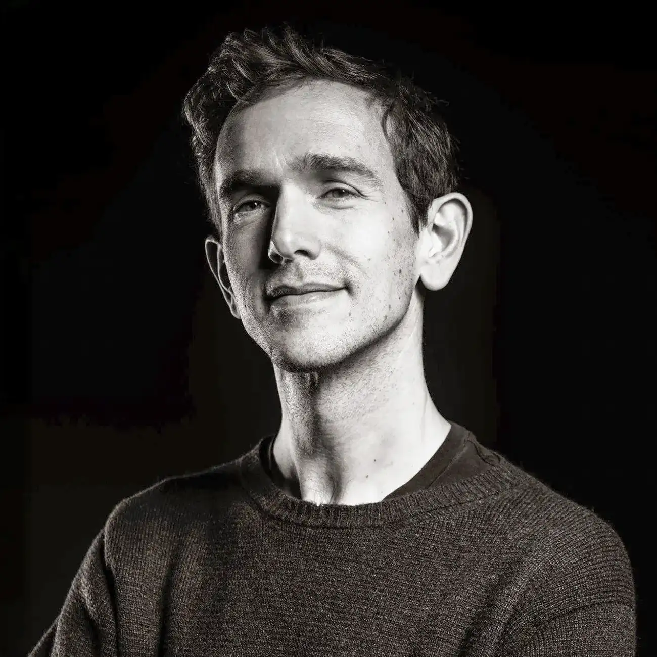 Black and white portrait of a young professional man